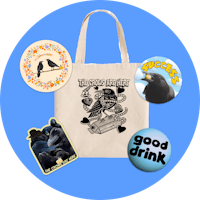 a tote bag with various badges and stickers